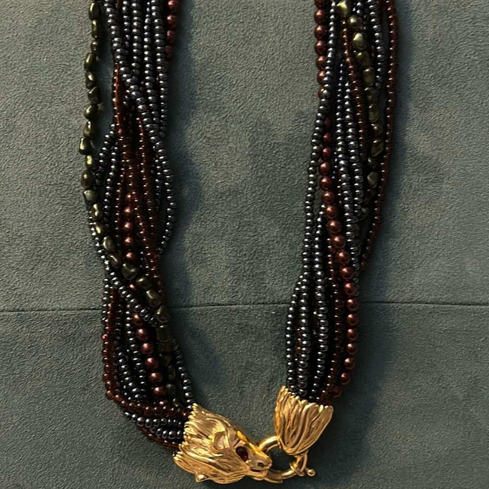 Beautiful necklace by Joan Rivers lion heads.  black, green copper, gray …
